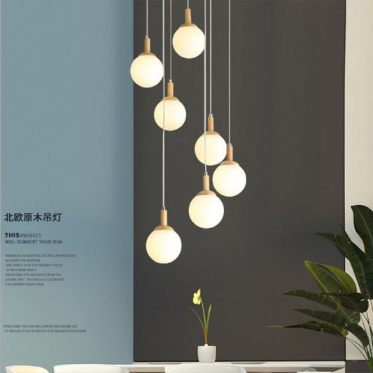 Modern Minimalist Duplex Staircase Long Pendant Light Nordic Creative Stairwell Villa Apartment Magic Bean Rotating Solid Wood Pendant Light