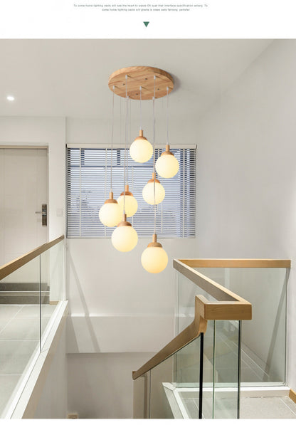 Modern Minimalist Duplex Staircase Long Pendant Light Nordic Creative Stairwell Villa Apartment Magic Bean Rotating Solid Wood Pendant Light